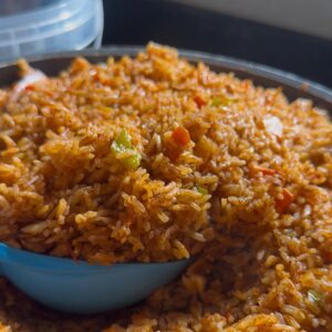 Jollof Rice( Goat meat or Peppered Turkey)